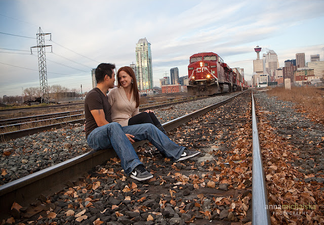 couples on train tracks