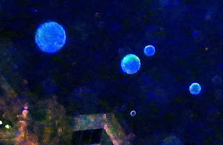 blue orbs in sky