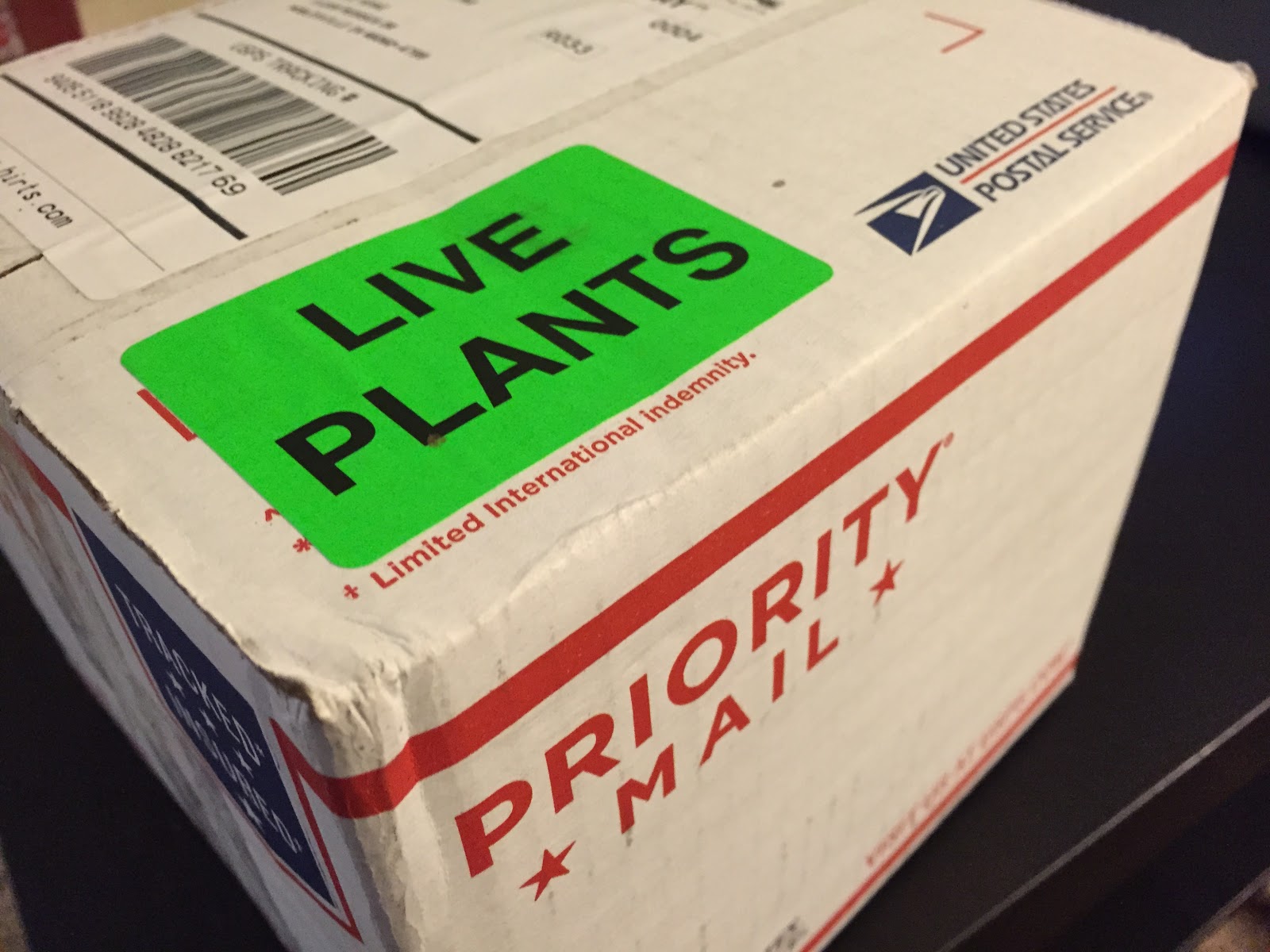 live plants sticker on package