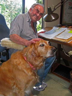 Bill Kraft at his composition desk with Gingi (May 2010)