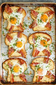 A quick classic that comes together right on a sheet pan!!! Less mess, less fuss and just way easier than the stovetop version! Is it just me, or do eggs just taste better when it's fried in a hole of a slice of bread? It's not just me, right? And does it not taste better with bacon and freshly.