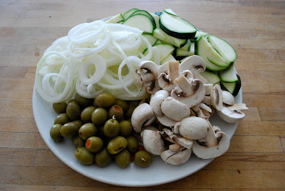 Zukinie - onions - olives - mushrooms - chopped