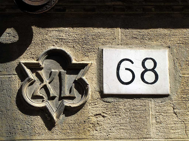 Latin numerals on a building, Pisa