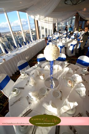 of the white carnation ball centerpieces and Sarah complimented the look