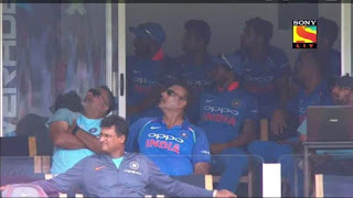 INDIAN CRICKET TEAM LOOKING AT REPLAY