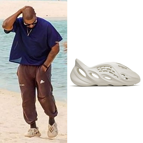 Kanye West in white foam Yeezy sneakers