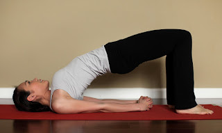 Bandha Sarvangasana Yoga Positions to Shrink the Stomach