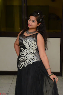 Shrisha Dasari in Sleeveless Short Black Dress At Follow Follow U Audio Launch 015.JPG