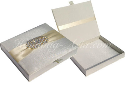 Wholesale lace invitations and lace fabric covered wedding boxes from Custom boxes can be manufactured in size and color