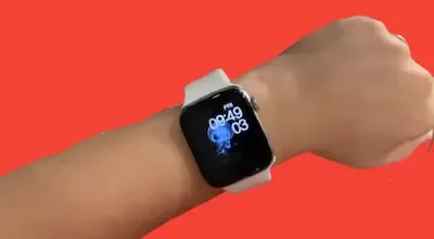 A picture of a LED with a T500 smartwatch on it