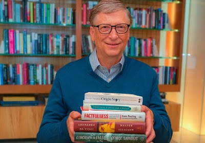 Does Bill Gates Believe In God Or Reads The Bible?  Bill Gates with some of his favorite books