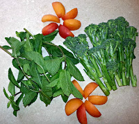 Vegetables arranged in a pattern on a kitchen worktop