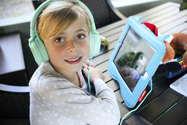 Come tech savvy for travel with kids. iPads and headphones are a must