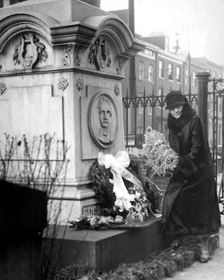 Lizette Reese Visiting Poe's Grave