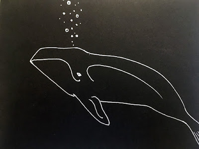 A horizontal pen drawing on black paper, in silver pen, of a humpback whale swimming right to left, blowing bubbles. It's a very simple line drawing, with almost no textures or internal contour lines.