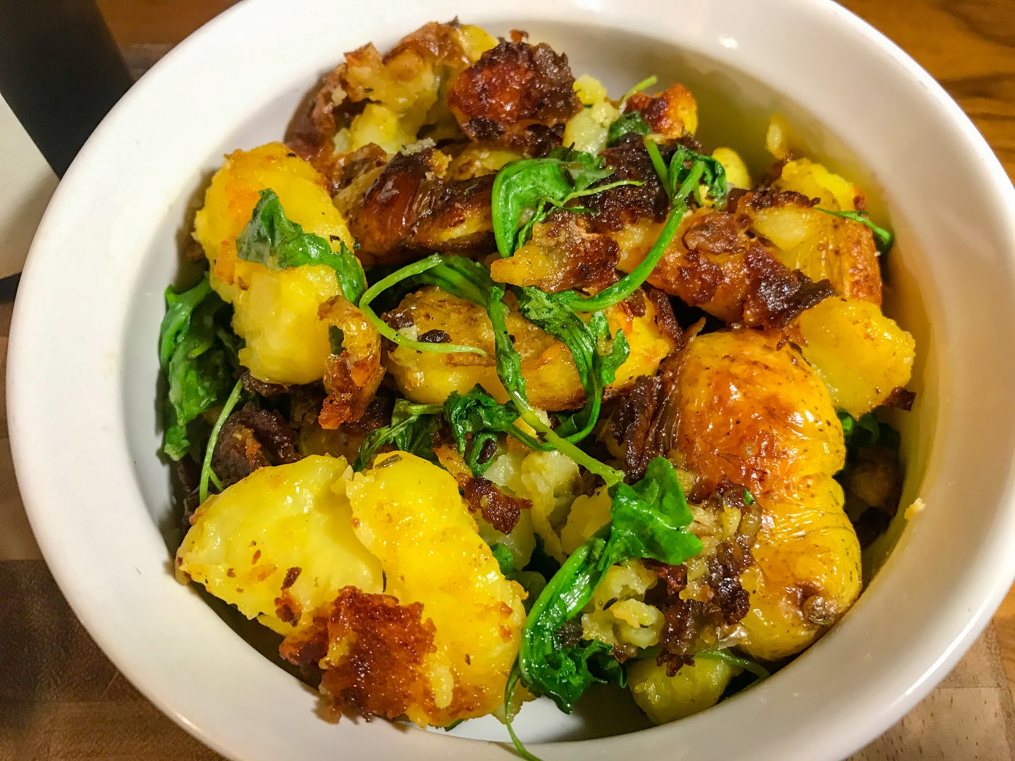 Smashed Potatoes with Herbs and Arugula