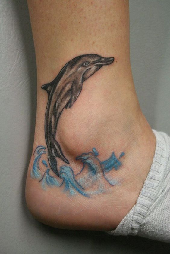 Dolphin-Jump-on-the-Waves-Ankle-Tattoo
