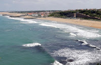 An aerial view shows a sea wall on the beach that protects sand dunes from erosion along the Atlantic Ocean coast in Anglet, southwestern France, June 20, 2015. (Credit: Reuters/Regis Duvignau) Click to Enlarge.