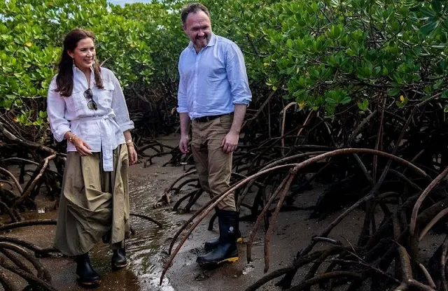 Princess Mary wore a white belted linen shirt by Ralph Lauren, and a Terrana green skirt from By Malene Birger