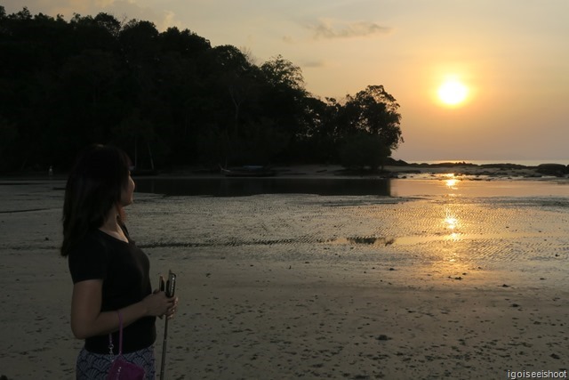 Watching the sun set on our first day at Klong Muang from the beach.