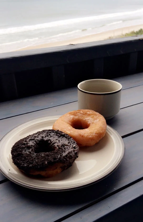 Enjoying a cup of coffee and my favorite doughnuts from The Fractured Prune in North Topsail Beach, NC.