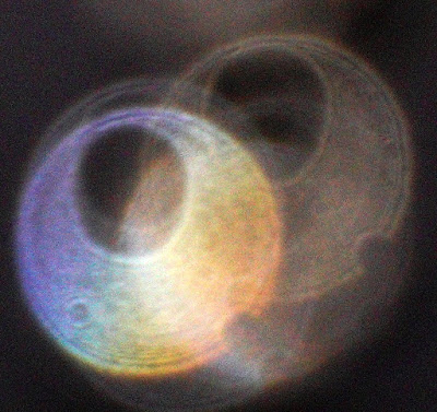 colorful orbs with oval hole