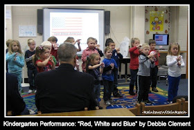 photo of: Kindergarten Children Performing: "Red, White and Blue" by Debbie Clement