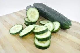 Cucumber cut on a wooden table, Health Benefits of Cucumber