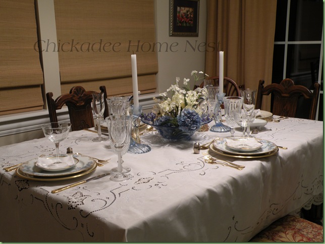  an antique white linen masterfully handembroidered in icy barely blue 