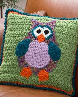 http://www.redheart.com/free-patterns/whimsical-owl-pillow