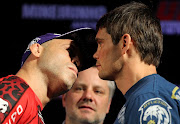 Wanderlei Silva and Rich Franklin staredown at the UFC 147 press conference .