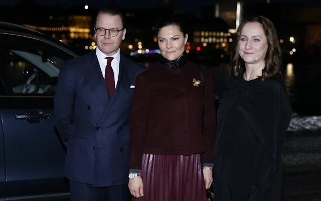 Crown Princess Victoria wore a burgundy pleated faux leather skirt from By Malina, and burgundy wool jacket