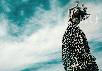 woman in flowing dress, woman in giraffe print dress, animal prints