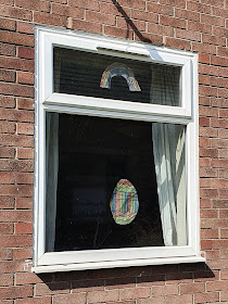 Easter Egg and Rainbow in the window