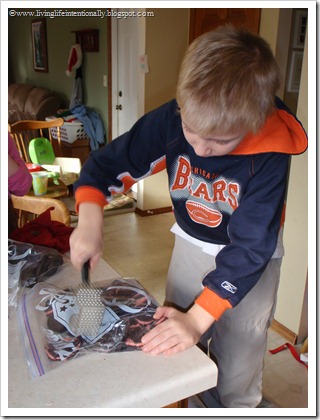 Kids love helping make oreo ball cookies in the kitchen