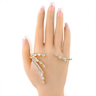 https://www.amazon.in/gp/search/ref=as_li_qf_sp_sr_il_tl?ie=UTF8&tag=fashion066e-21&keywords=pearl Palm Cuff&index=aps&camp=3638&creative=24630&linkCode=xm2&linkId=bb40bb1b516d54033beda86aa1997fd7