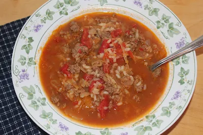 Serving bowl of cabbage roll soup.