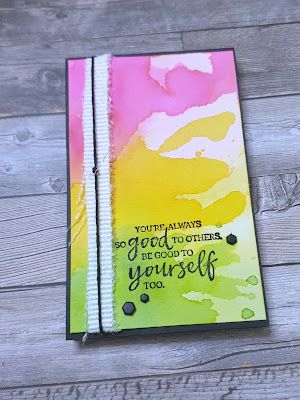 Watercolour puddle covered notebook