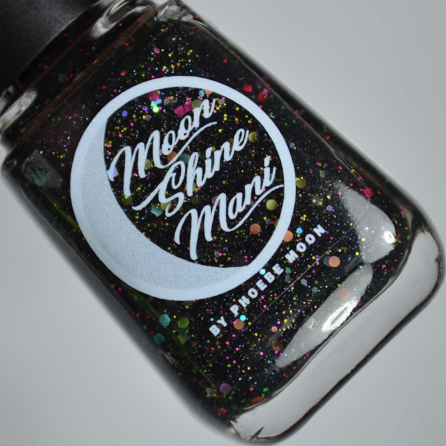 black nail polish with rainbow glitter in a bottle