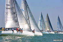 J/111 one-design sailboats- sailing off start