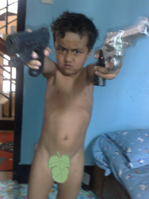 Kid with two guns