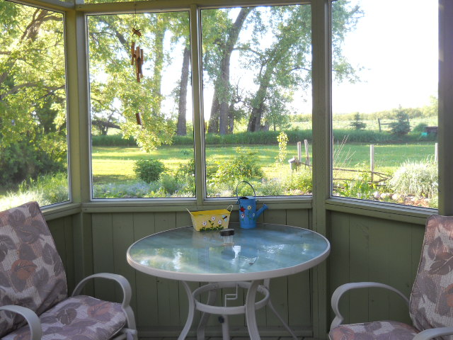 inside screened in hexagon gazebo