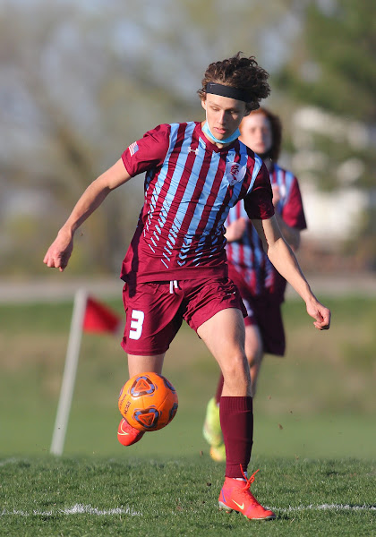 Logan Ingram dribbles the ball down the field