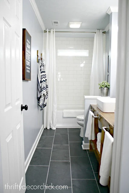 modern farmhouse bathroom with wall removed