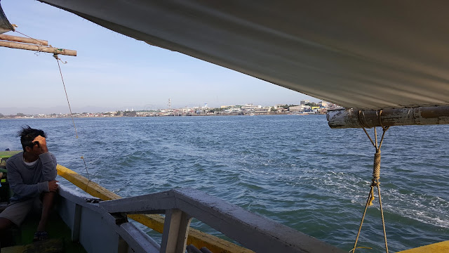 Iloilo City seafront viewed from a boat on the way to Guimaras