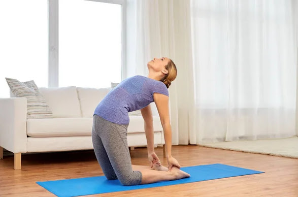 Girl doing Camel pose