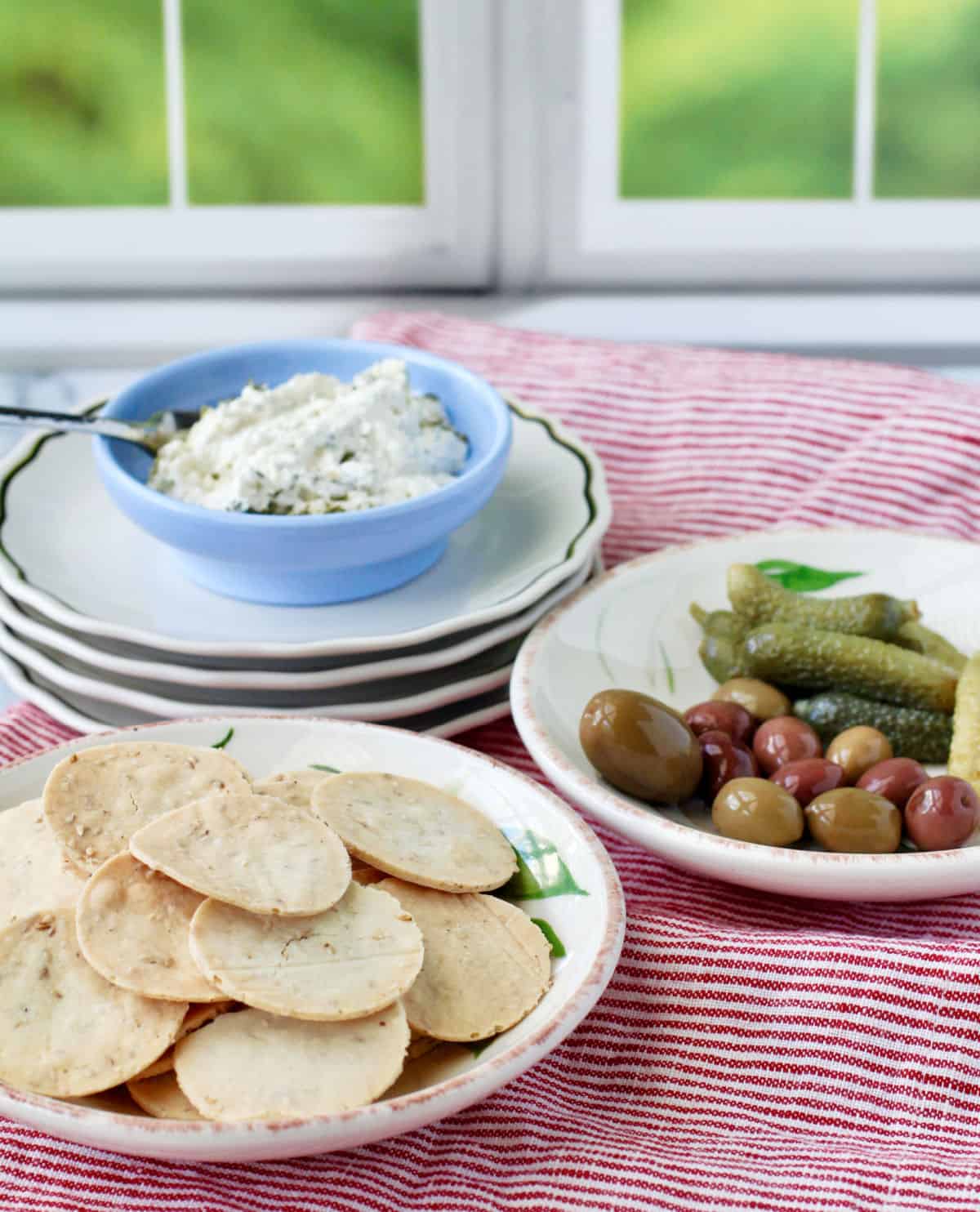 Rice and Almond Thin Crackers with various appetizers.