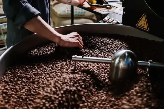 Discover the secrets of coffee roasting with our comprehensive guide. From green beans to rich aroma, master the art of coffee roasting today.