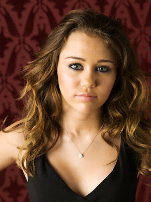 miley cyrus hairstyles 2009. Miley Cyrus a celebrity with beautiful Hairstyles