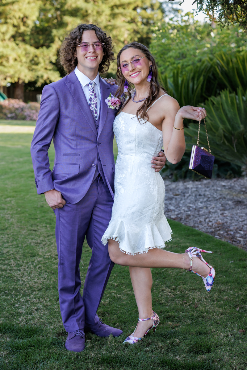 Senior prom photo boy and girl purple attire
